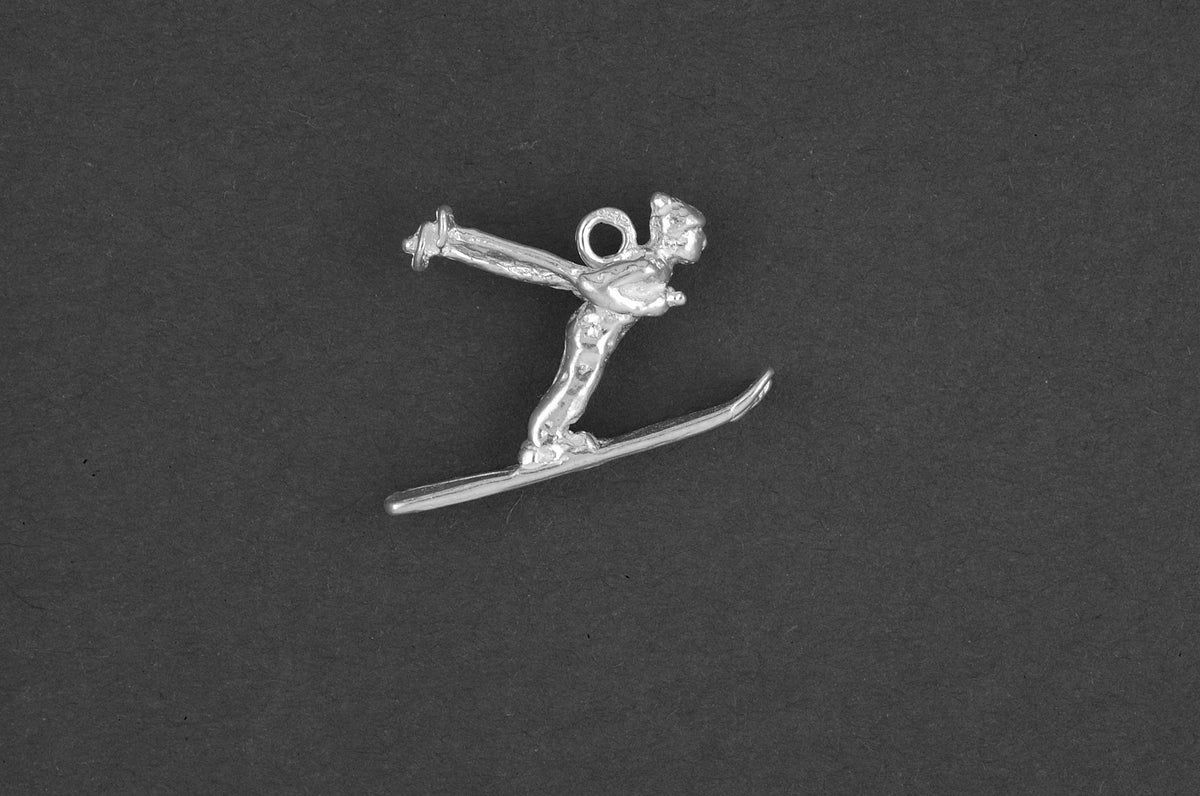 Skier - Goud